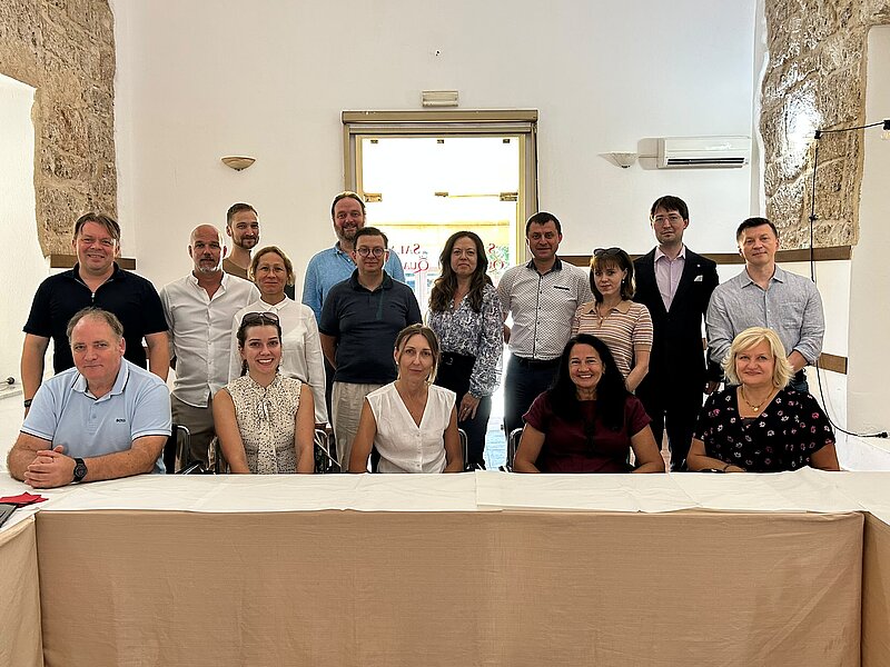 ASI researchers at an intensive week of scientific meetings and conference activities in Alghero, Sardinia